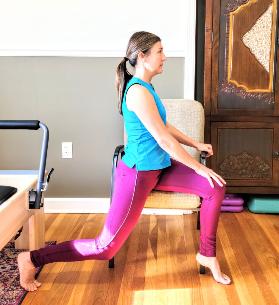 Seated hip flexor stretch for posture exercises